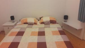 Postel nebo postele na pokoji v ubytování Apartment Piranhe