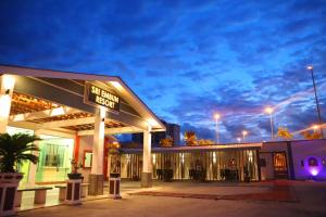 a building with a sign that reads no brain hospital at Sri Embun Resort Langkawi in Pantai Cenang