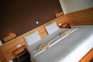 Postel nebo postele na pokoji v ubytování The Chillout Ella