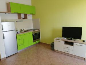 Kuchyň nebo kuchyňský kout v ubytování Apartments Jurjevic