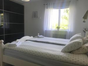 Postel nebo postele na pokoji v ubytování Villa Daga