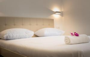 Postel nebo postele na pokoji v ubytování Apartments Latkovic