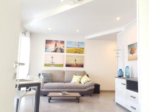 A seating area at Island Apartment Porto Cesareo