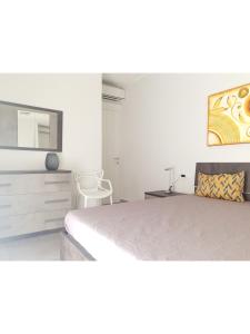 A seating area at Island Apartment Porto Cesareo