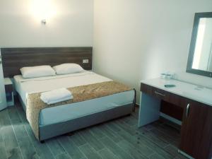Postel nebo postele na pokoji v ubytování Valeri Beach Hotel