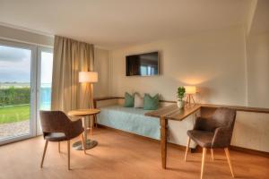 Posezení v ubytování BE BIO Hotel be natural - direkt am Wasser