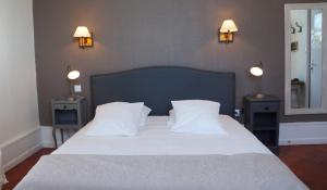 Letto o letti in una camera di Hotel Savel