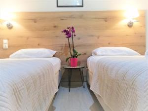 A bed or beds in a room at The Mathraki Studios