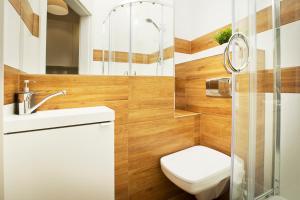 Ванна кімната в Monte Cassino Apartments
