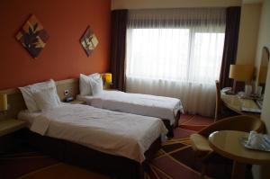 Letto o letti in una camera di Mari Vila Hotel
