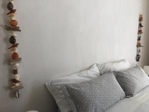 Postel nebo postele na pokoji v ubytování FICOMORO surf house