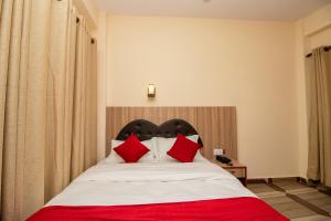 Uma cama ou camas num quarto em The Country Yard