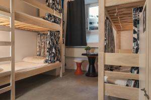 Posteľ alebo postele v izbe v ubytovaní Stay Swanky Hostel