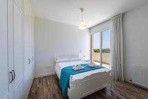 Ein Bett oder Betten in einem Zimmer der Unterkunft Larnaca Villa Marisol Kiti
