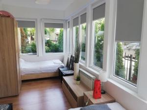 Posteľ alebo postele v izbe v ubytovaní blatoapartament