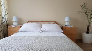 Posteľ alebo postele v izbe v ubytovaní Hotel Śnieżnik