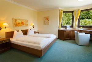 Krevet ili kreveti u jedinici u okviru objekta Hotel Seewinkel