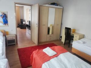 Posteľ alebo postele v izbe v ubytovaní blatoapartament