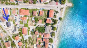 an aerial view of a city next to the water at Apartments Latkovic in Zaostrog