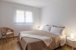 Postel nebo postele na pokoji v ubytování Apartamento La Nuit con Parking gratis en centro histórico