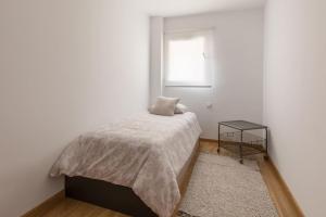 Postel nebo postele na pokoji v ubytování Apartamento La Nuit con Parking gratis en centro histórico