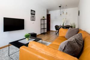 TV a/nebo společenská místnost v ubytování Apartamento La Nuit con Parking gratis en centro histórico