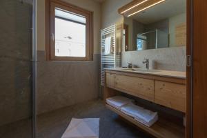 Koupelna v ubytování Chalet Cuna Bela + 75 fotografií