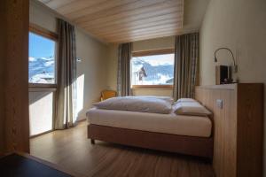 Postel nebo postele na pokoji v ubytování Chalet Cuna Bela