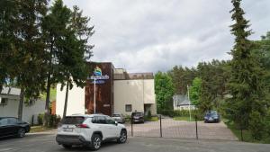 Budova, kde se aparthotel nachází