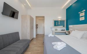 TV a/nebo společenská místnost v ubytování Stathis Studios I