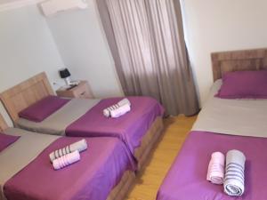 Postel nebo postele na pokoji v ubytování Tskaltubo Guest House On Mirian Mepe