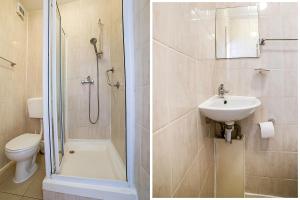 a bathroom with a shower and a sink and a toilet at Stratford Hotel in London +56 photos
