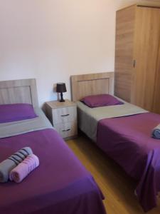 Postel nebo postele na pokoji v ubytování Tskaltubo Guest House On Mirian Mepe