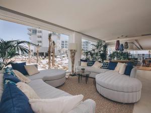 A seating area at Amàre Beach Hotel Ibiza - Adults Recommended