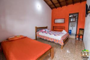Postel nebo postele na pokoji v ubytování Hotel Dulce Campestre