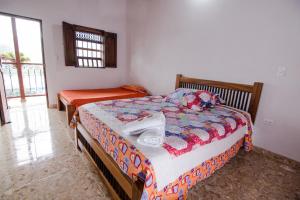 Postel nebo postele na pokoji v ubytování Hotel Dulce Campestre