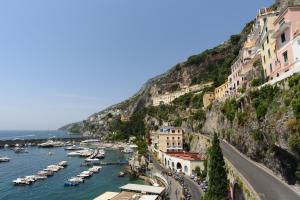 a view of positano on the amalfi coast at Dimore De Luca- Sea View in Amalfi