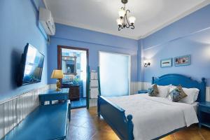 Postel nebo postele na pokoji v ubytování Memory Inn Guilin Central