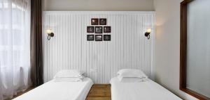 Postel nebo postele na pokoji v ubytování Memory Inn Guilin Central