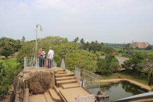 a group of people standing on top of a bridge at Miheen Hotel & Resort - Anuradhapura in Mihintale