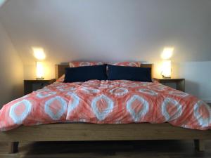
Ein Bett oder Betten in einem Zimmer der Unterkunft Pension Sommer

