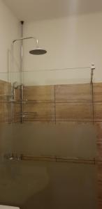 Kúpeľňa v ubytovaní Lotti apartman