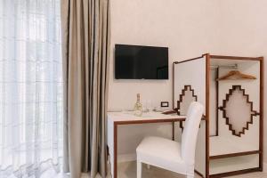 TV a/nebo společenská místnost v ubytování Maera B&B Ravello