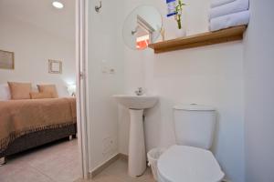 Koupelna v ubytování Mucura Hotel & Spa + 92 fotografií