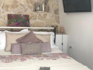 Postel nebo postele na pokoji v ubytování Casa di Lavanda