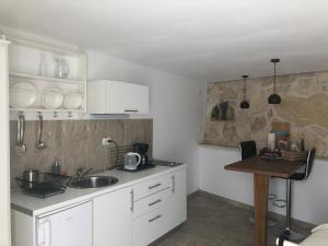 Kuchyň nebo kuchyňský kout v ubytování Casa di Lavanda