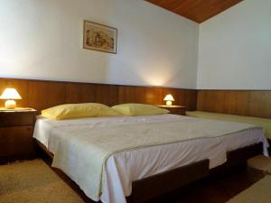 Ένα ή περισσότερα κρεβάτια σε δωμάτιο στο Guesthouse Matko