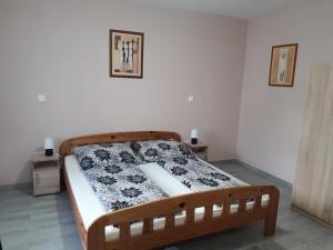 Posteľ alebo postele v izbe v ubytovaní Aquatherma Apartman