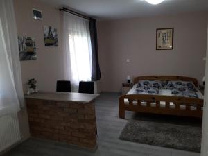Posteľ alebo postele v izbe v ubytovaní Aquatherma Apartman