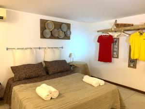 Posteľ alebo postele v izbe v ubytovaní Azzurra Flat Bari Center
